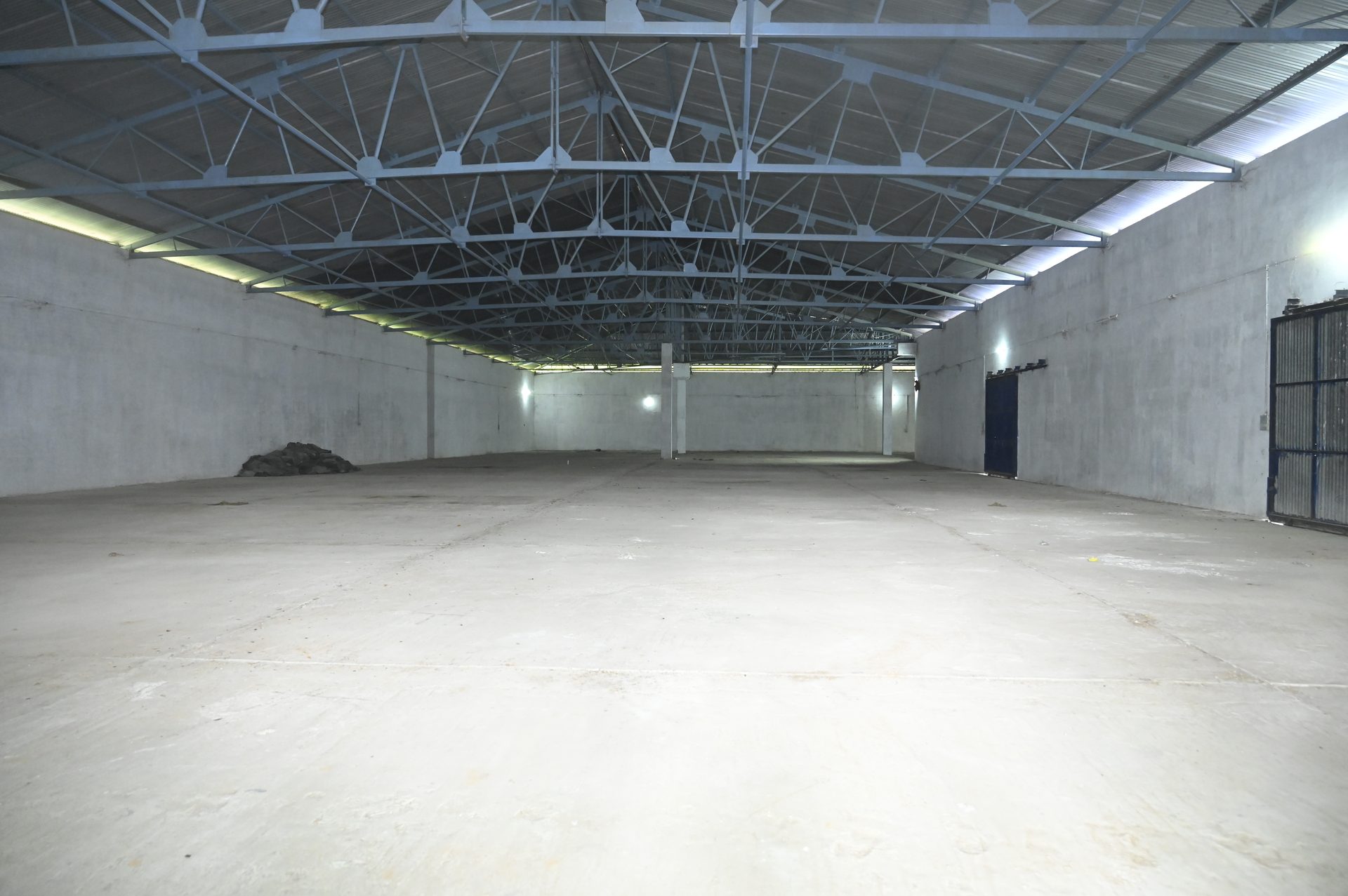 Warehouse interior with steel trusses